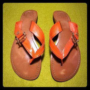 Tory Burch flip flops.